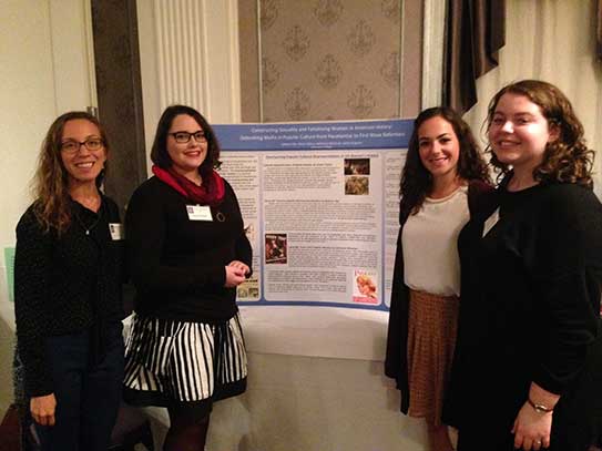 Students and professor Jamie Wagman present at a history conference