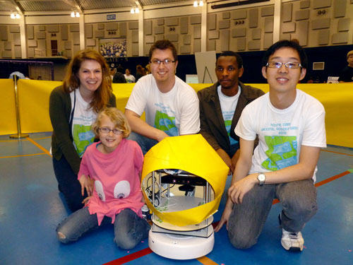 Pictured from left to right are Saint Mary’s College student Theresa Nucciarone and University of Notre Dame students Travis Brown, Sam Njoroge and Kai Zhao. In front as the “ghost” is Ellie Brown, daughter of Travis, and “Pac-bot.”